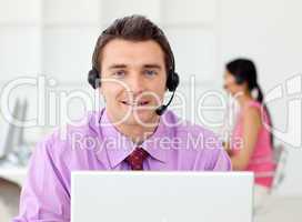 Attractive businessman with headset on