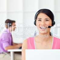 Laughing Customer service representative using headset