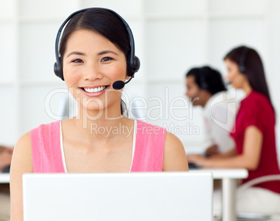 Asian Businesswoman using headset