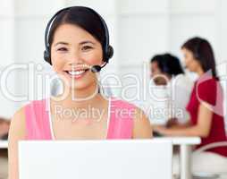 Asian Businesswoman using headset