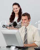 Assertive manager checking her employee's work