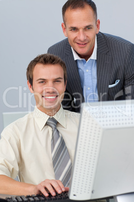 Attractive manager checking his employee's work