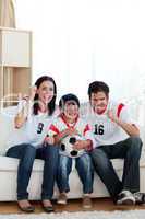 Lively famil ywatching football match