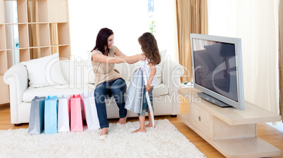 Mother and her daughter at home after shopping