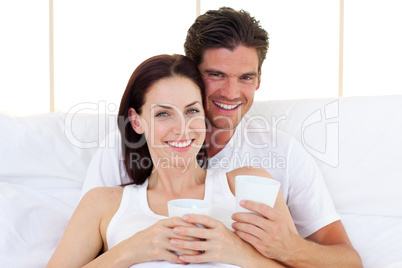 Loving couple drinking coffee