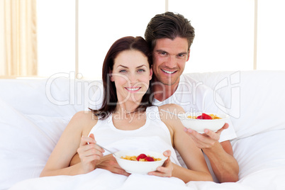 Enamoured couple having breakfast