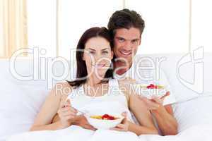 Enamoured couple having breakfast