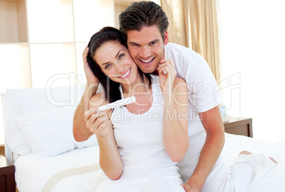 Close-up of couple finding out results of a pregnancy test