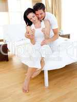 Cheerful couple finding out results of a pregnancy test
