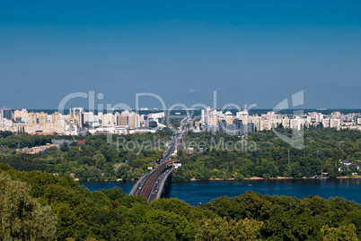 Bridge over Dnieper river and Kyiv residential area, Ukraine