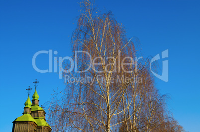 Autumn. Church and birch.