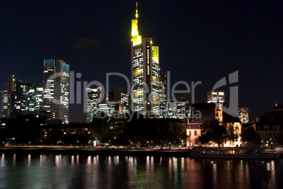 Frankfurt banking district and Main river at night