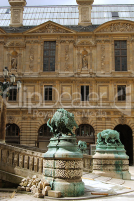 Statues of boar and wolf in Louvre
