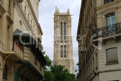 Medieval tower between two houses