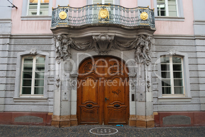 Massive door to medieval mansion, Freiburg, Germany