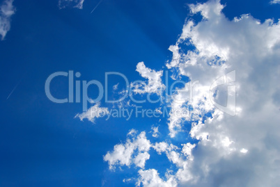 Glowing cloudscape with sunbeams