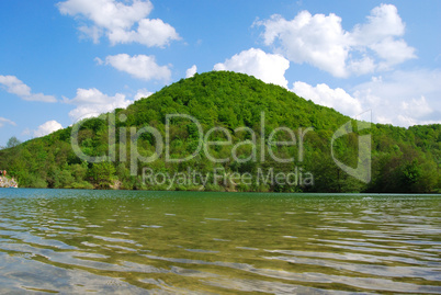 Lake reflecting the hill