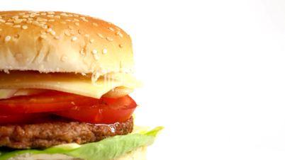 Rotating Tasty hamburger on white background, loopable