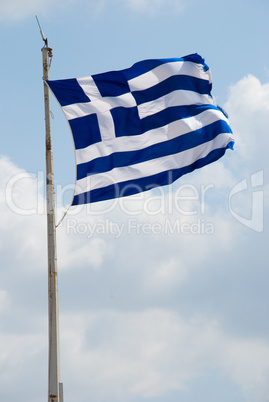 Waving flag of Greece against the blue sky