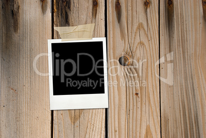 Grunge wood background with photo card