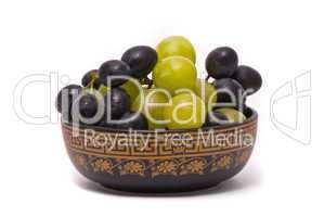 Green and blue grapes on a studio white background