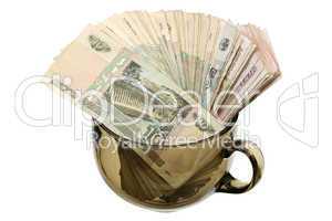 Money in a glass cup