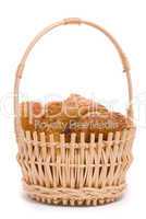 Fresh buns in a basket on a white background