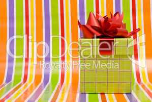 Gift box on a stripe background