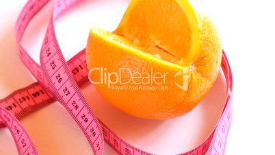 Tape measure and rotating orange