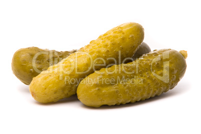 Salted cucumbers on a white background