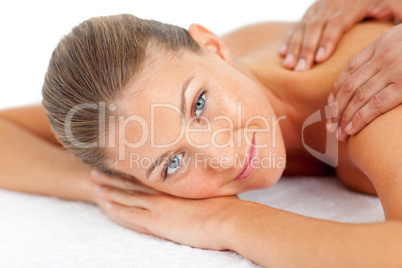 Portrait of blond woman enjoying a massage