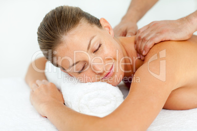 Quiet woman enjoying a massage