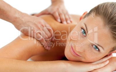 Smiling woman enjoying a massage