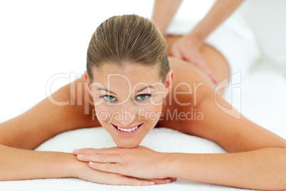 Peaceful woman enjoying a massage