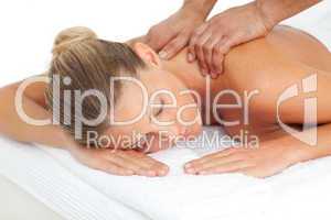 Caucasian woman enjoying a massage