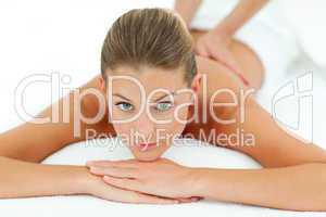 Reposing woman enjoying a massage