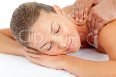 Portrait of asleep woman enjoying a massage