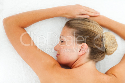 Peaceful woman relaxing after spa treatment