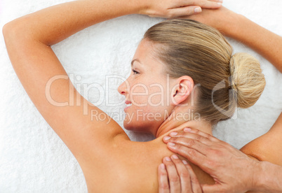 Close-up of woman enjoying a massage