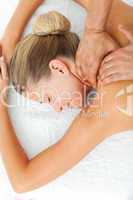 Asleep woman enjoying a massage