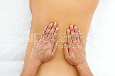 Close-up of hands giving massage