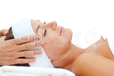 Relaxed woman enjoying a head massage