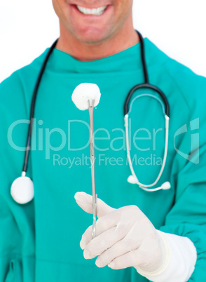 Close-up of surgeon holding surgical forceps