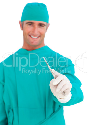 Assertive surgeon holding a stethoscope