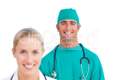 Attractive female doctor and a mature surgeon