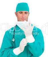 Charming surgeon wearing surgical gloves