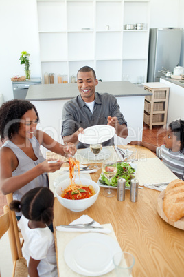 Afro-american family dining together