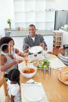 Afro-american family dining together