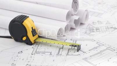 architectural blueprints & tape measure