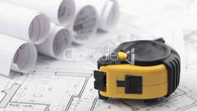 architectural blueprints & tape measure